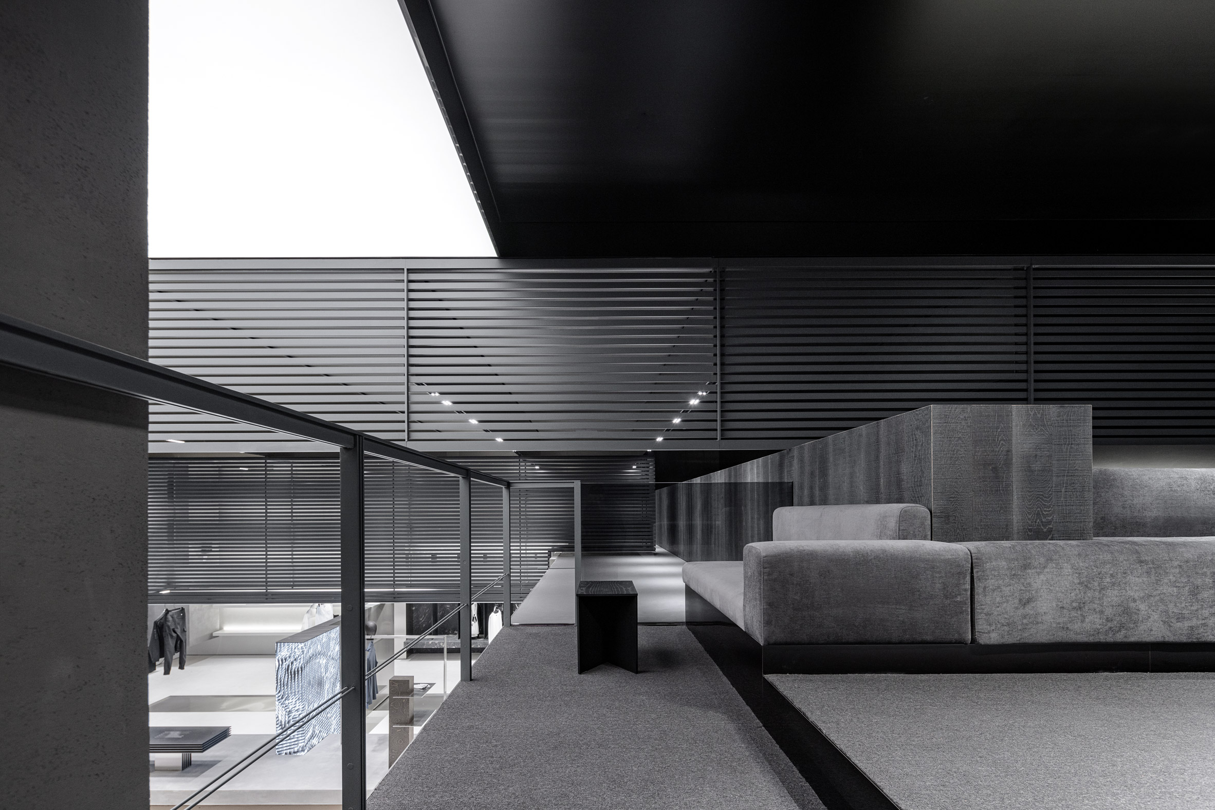 Mezzanine with grey soft furnishings in PXG flagship store 