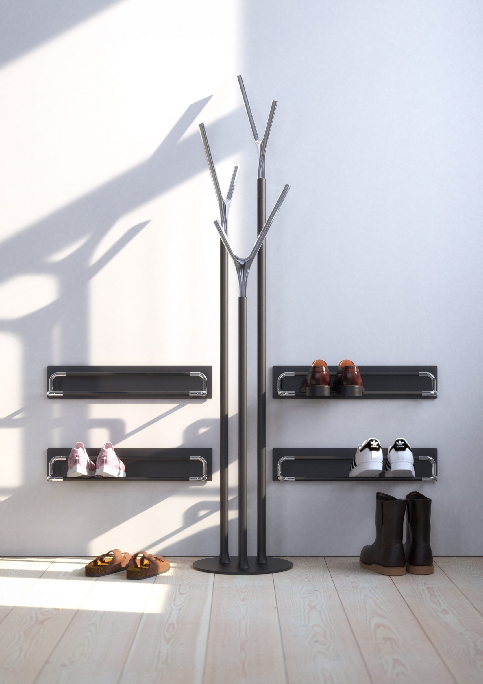 Photo of a black-coloured Wishbone stand by Frost in a minimal hallway with shoes on racks alongside