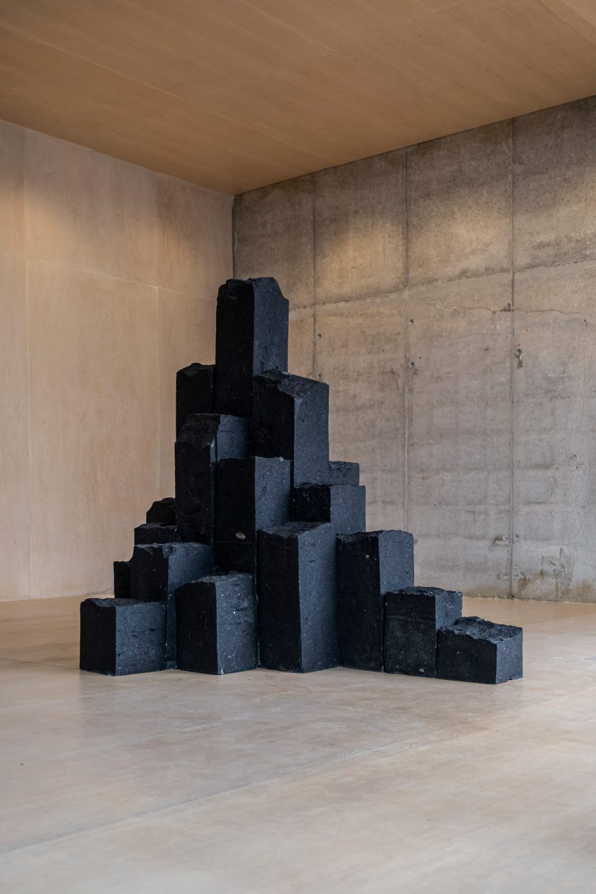 Black stone stacked installation