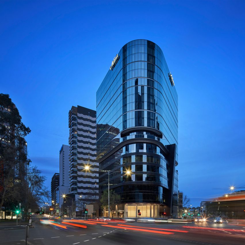 55 Southbank Boulevard mass-timber hotel extension with glass facade
