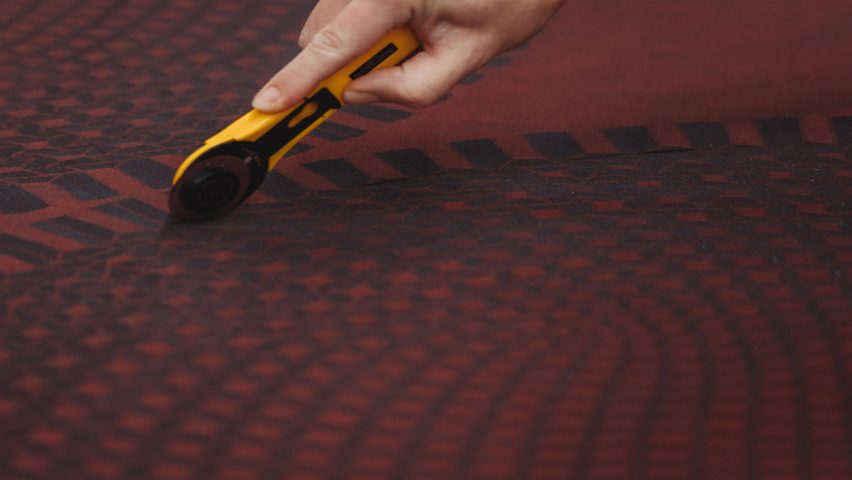Photo of fabric being cut
