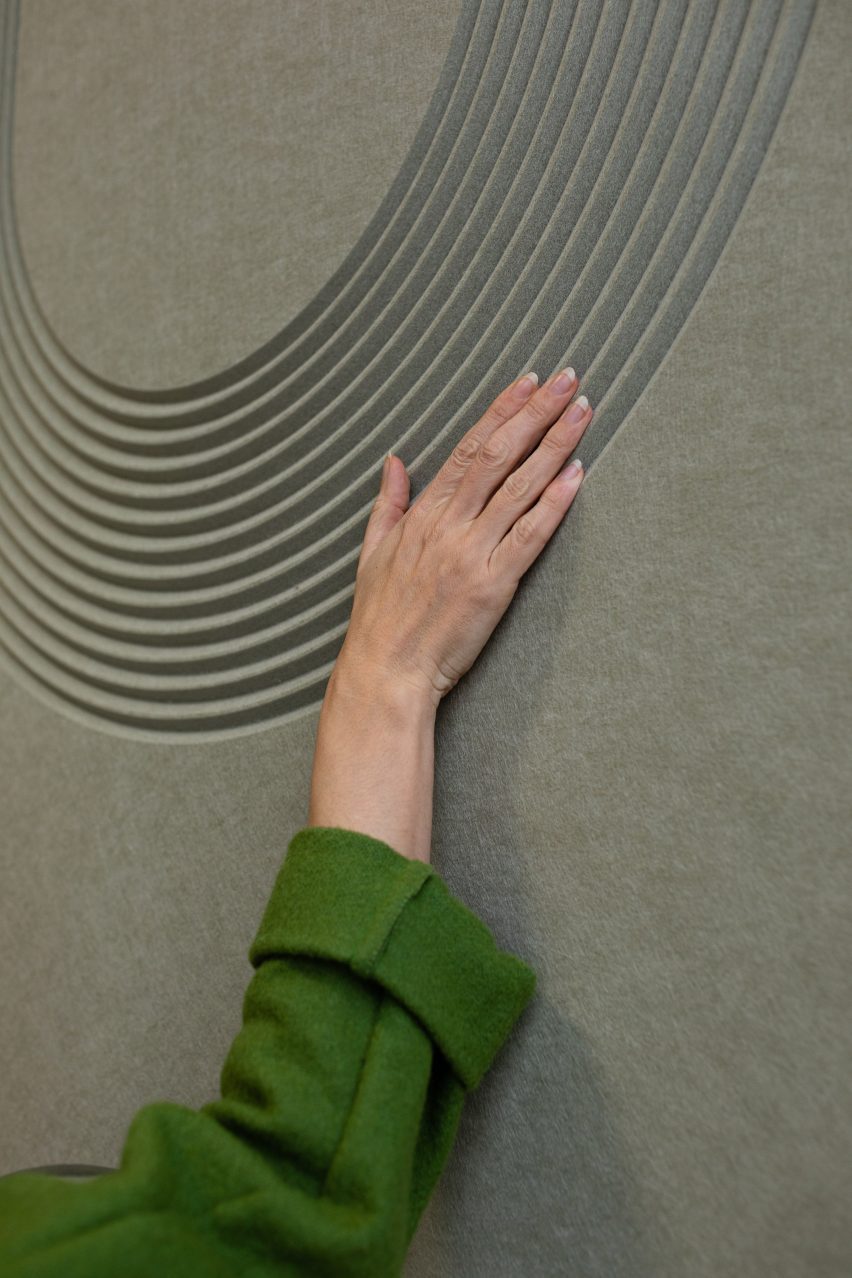 Curving pattern on acoustic panel by Freyja Sewell