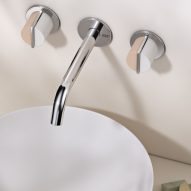 Chrome wall-mounted tap and handles by Varied Forms
