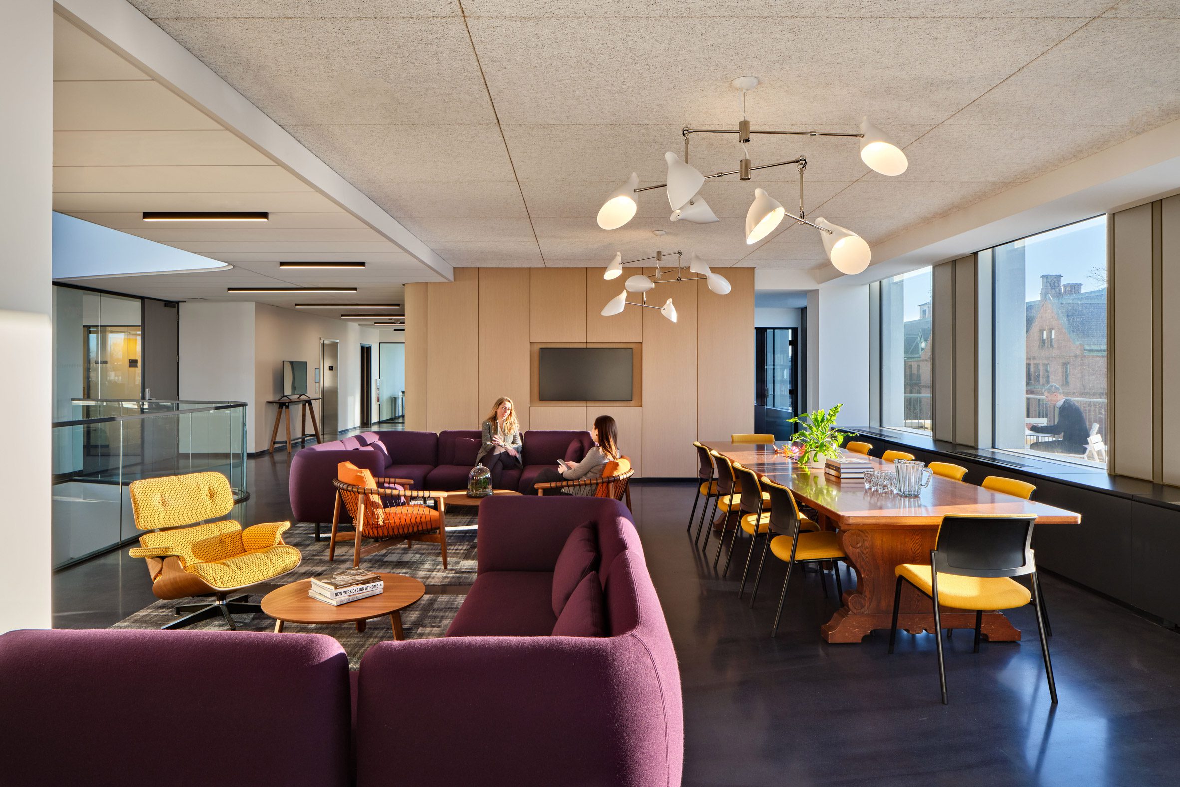 Colourful furniture within open-plan meeting space in Harvard building