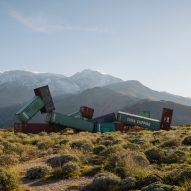 Desert X 2023 features a sculpture made of piled shipping containers