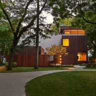 DMAC creates Michigan Lake House with cantilevered ash-clad volumes