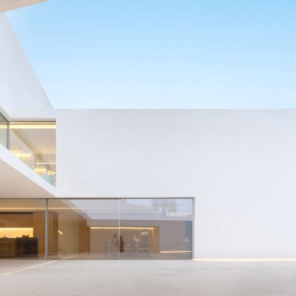 Fran Silvestre Arquitectos creates minimal home behind historic facade in Spain