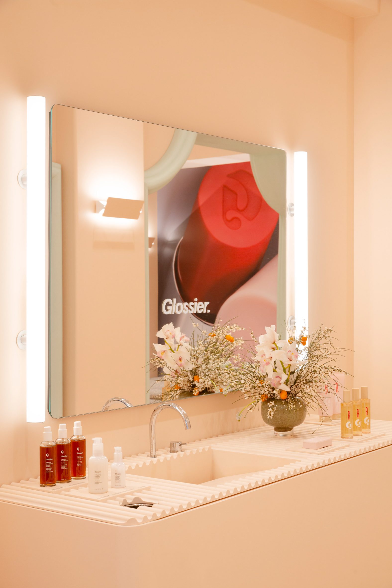 Product display in front of large mirror