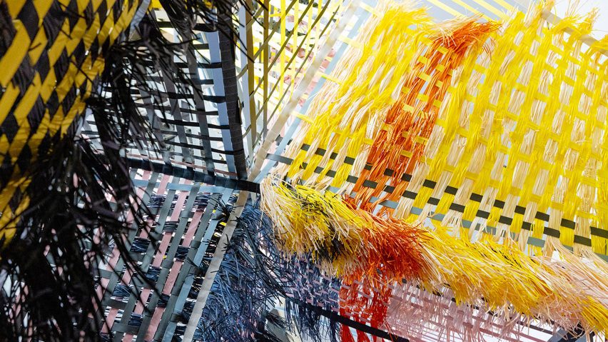 Multi-coloured Loom Room woven installation