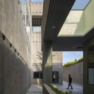 Hooba Design Group adds concrete volumes to unfinished office in Tehran