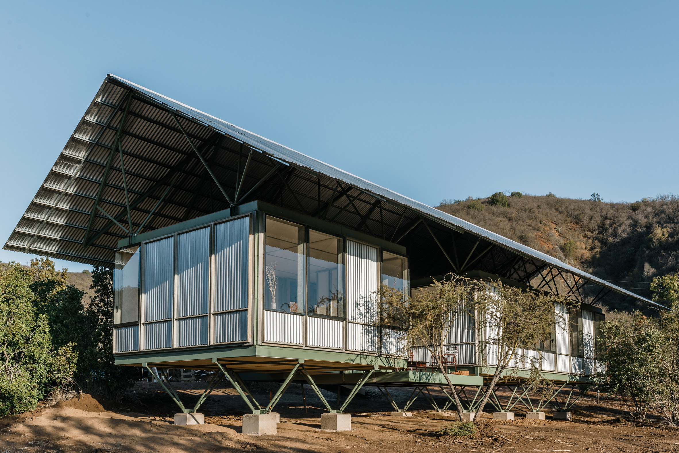 Layered recycled wood fiber panels on housing prototype in Chile