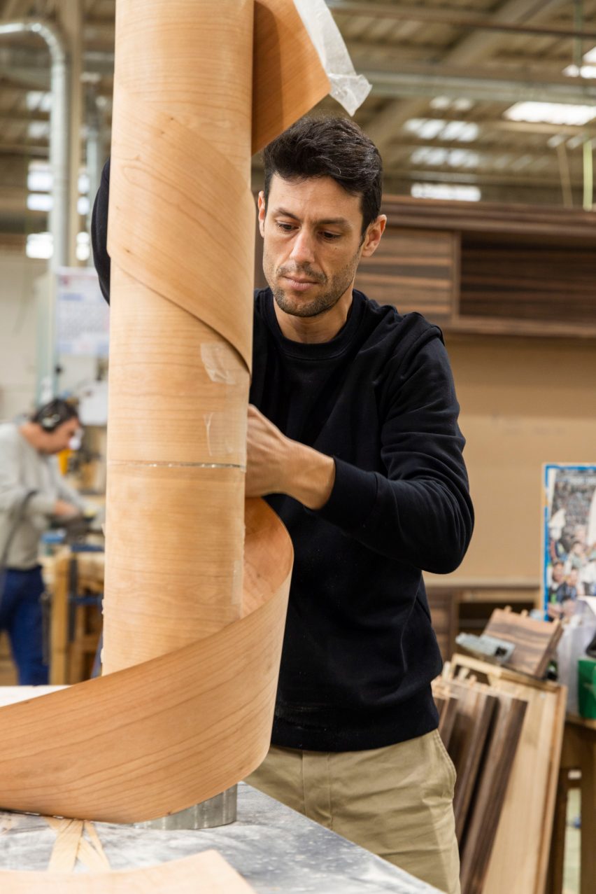 Jorge Penadés cretaing rolls of wood veneer for his Wrap furniture project