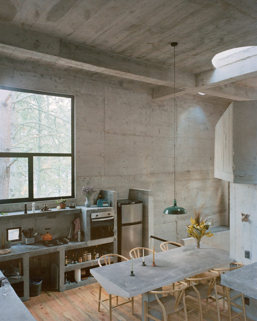 Kitchen within concrete house in Mexican forest