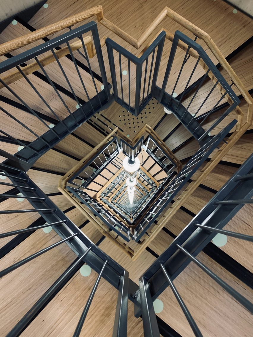 An interior staircase made from glulam timber
