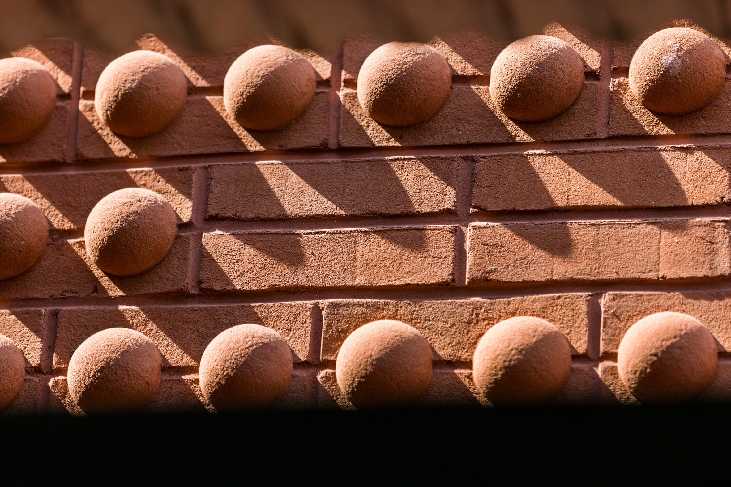 Domed brickwork on the exterior of the Grand Mulburry building by Morris Adjmi