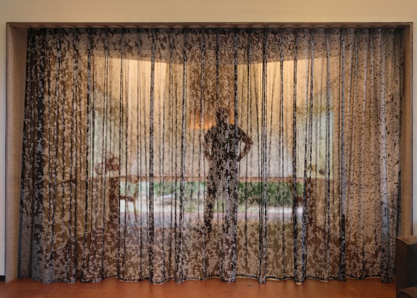 Sheer curtain decorated with abstract flocks of starlings
