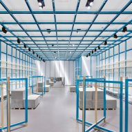 Demountable electric-blue grid engulfs On-Off store interior in Milan
