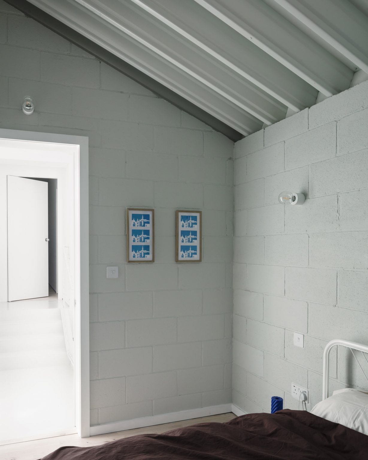 Pashenko Works adds corrugated metal and blockwork extension to ...