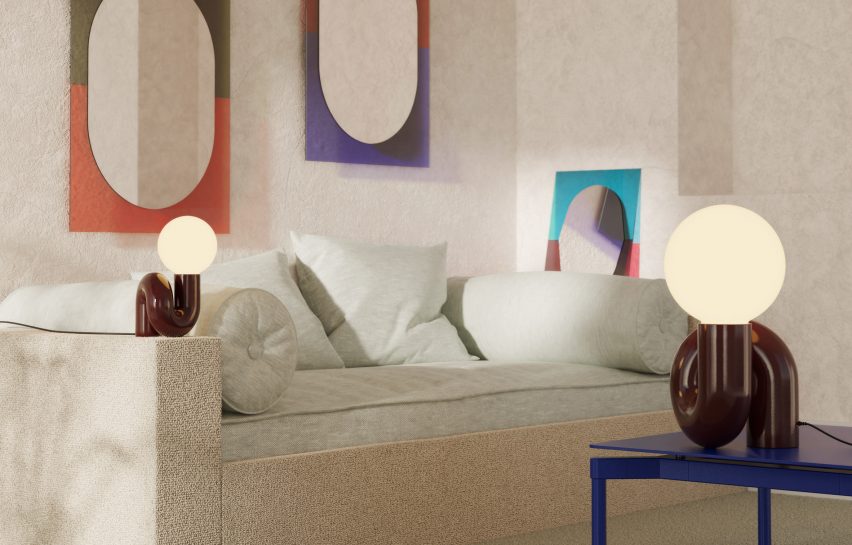 Three multicoloured mirrors by Petite Friture in a living room