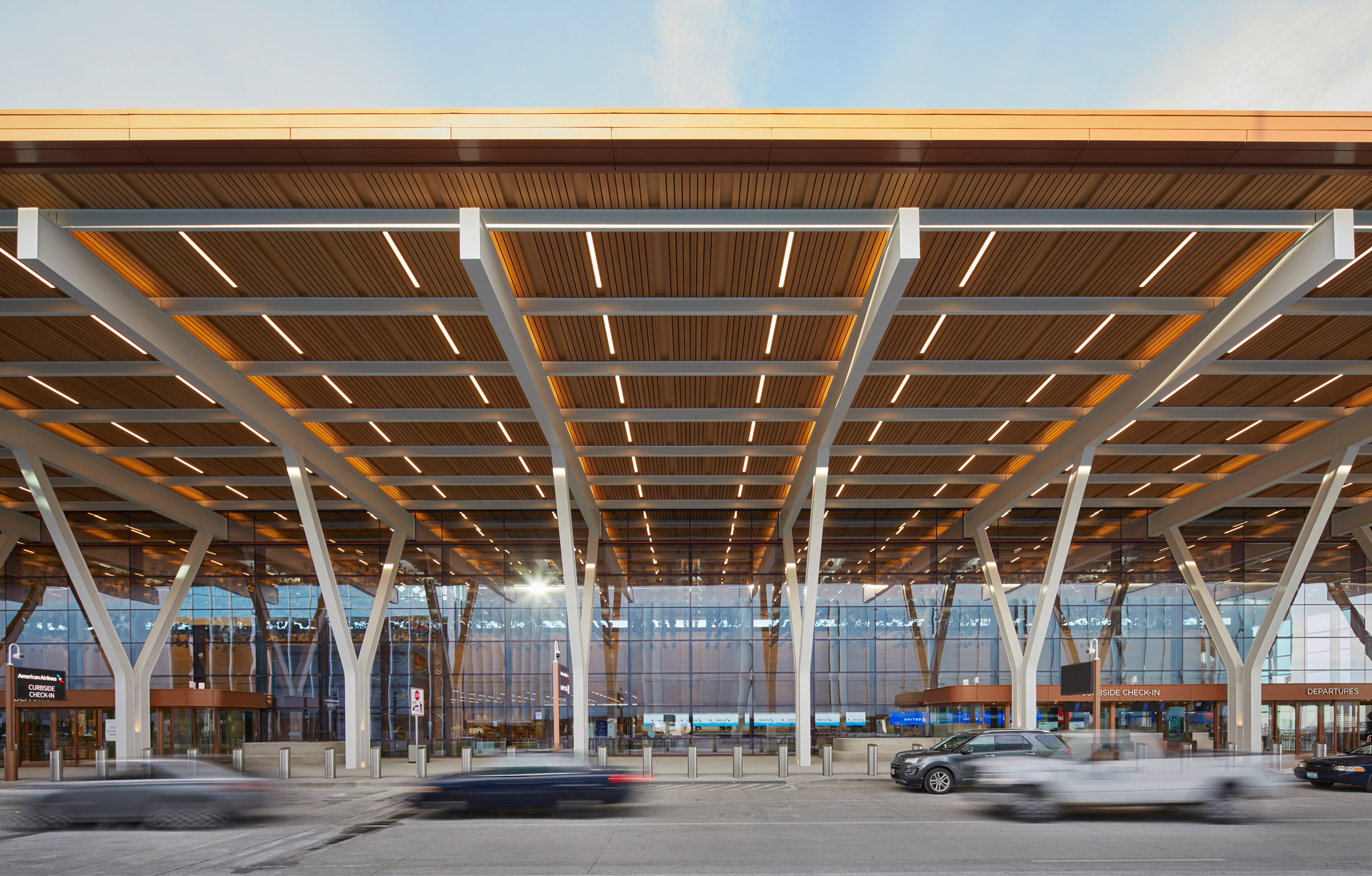Kansas City International Airport departures gate with wooden overhang