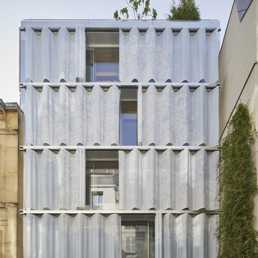 Moussafir Architectes retrofits 1970s Paris office with movable PVC curtains
