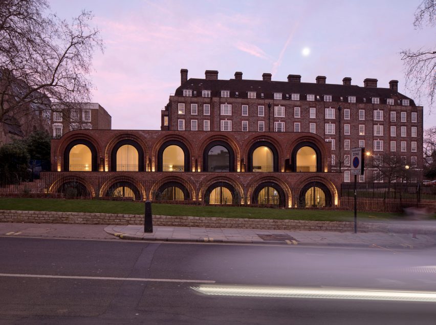 Night view of The Arches townhouses by The DHaus Company