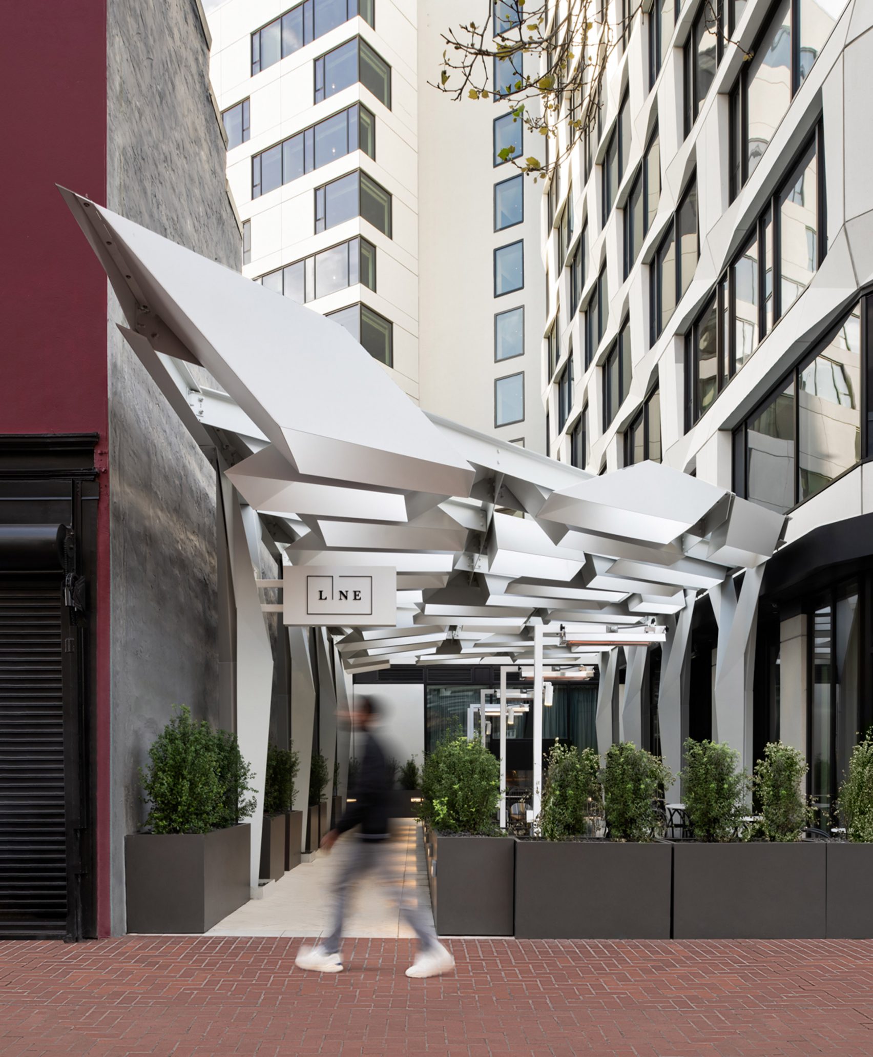 Faceted panels wrap Line Hotel and Serif building in San Francisco