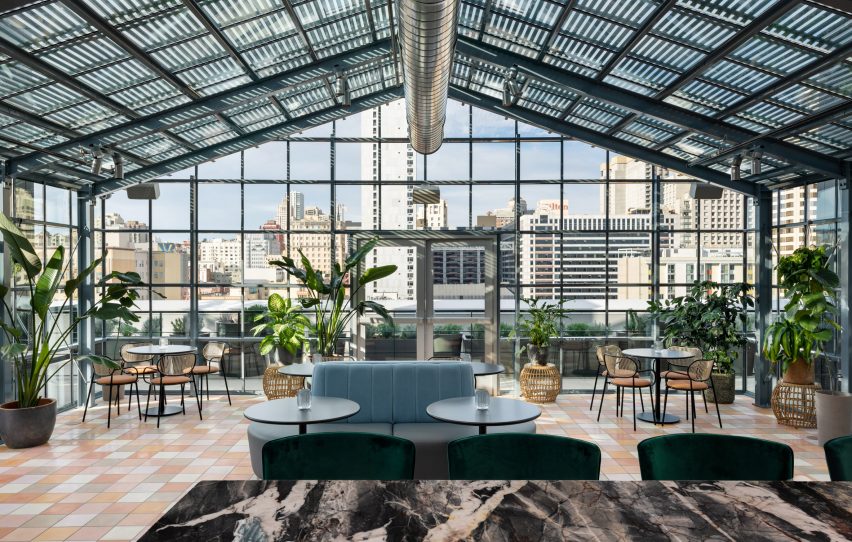 Industrial details within rooftop greenhouse-style pavilion at The Line Hotel