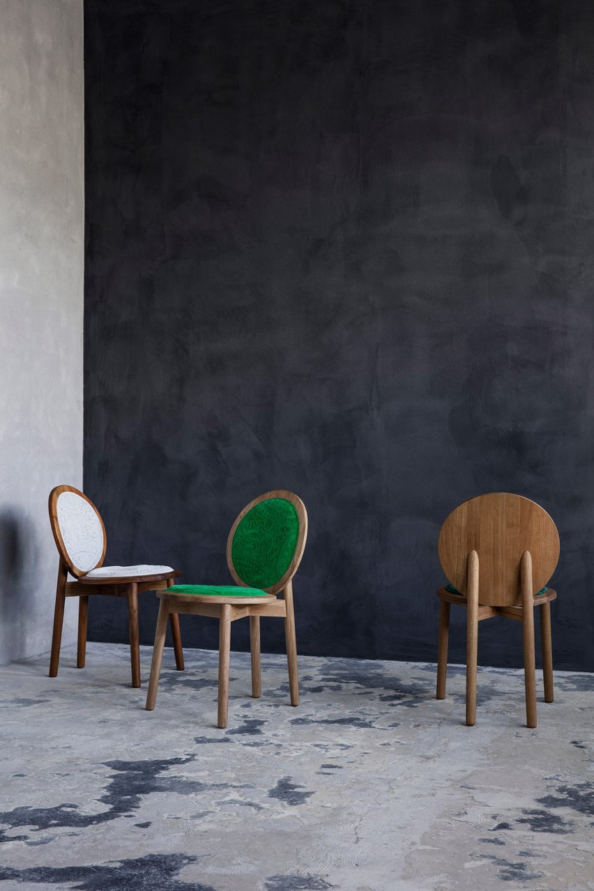 Three wooden chair with circular white and green upholstered seats by Ca'lyah