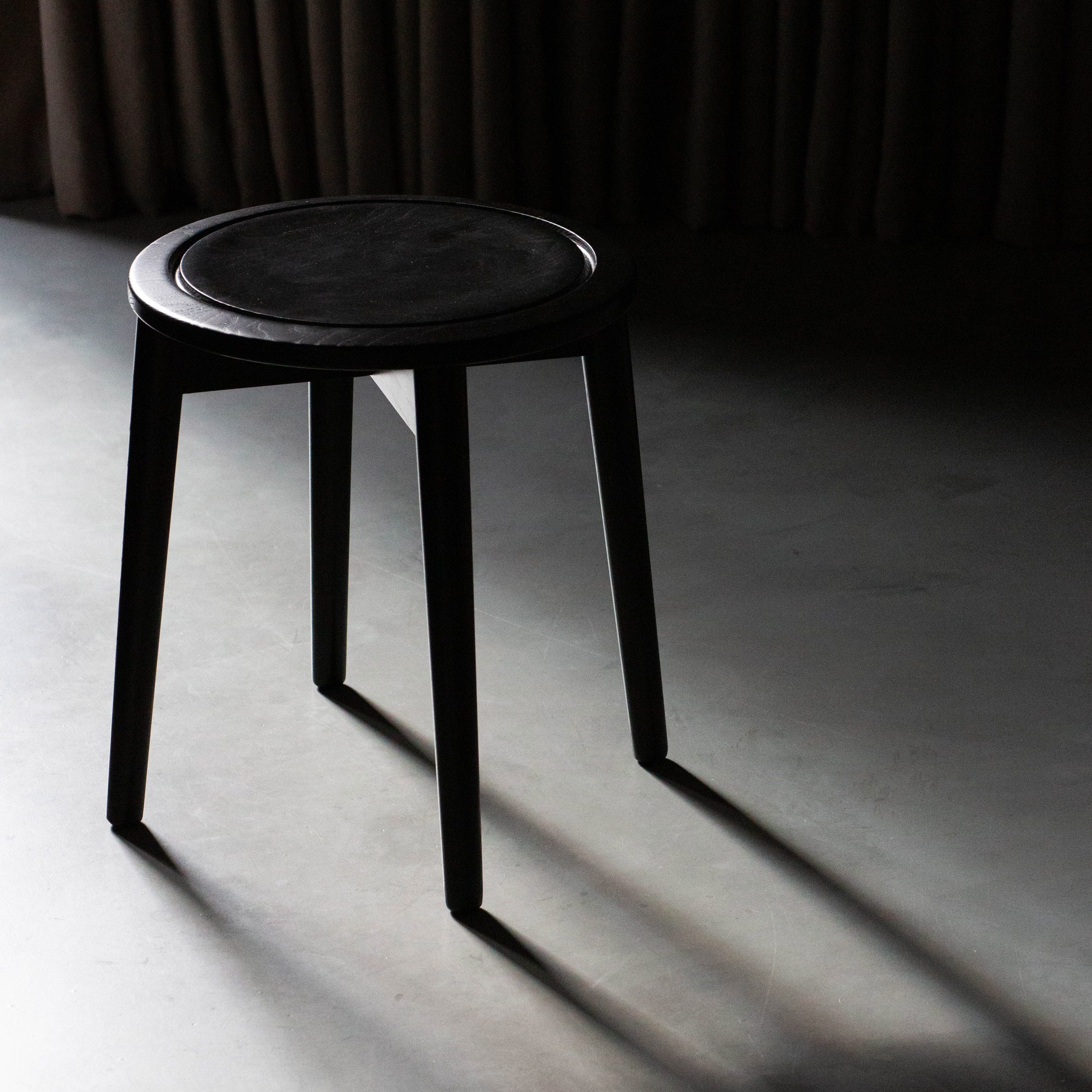 Dark wood stool