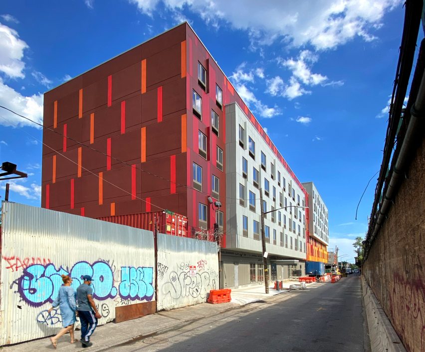 Red social housing building by Gluck+