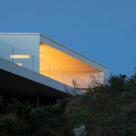 Saunders Architecture builds cross-shaped Villa Austevoll on top of Norwegian island
