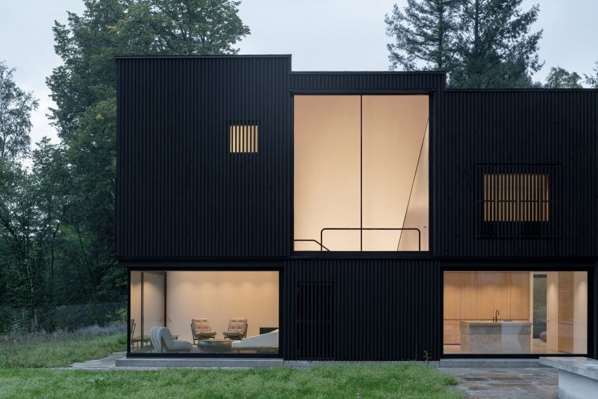 Black exterior of Wooden House by the Lake by Appels Architekten