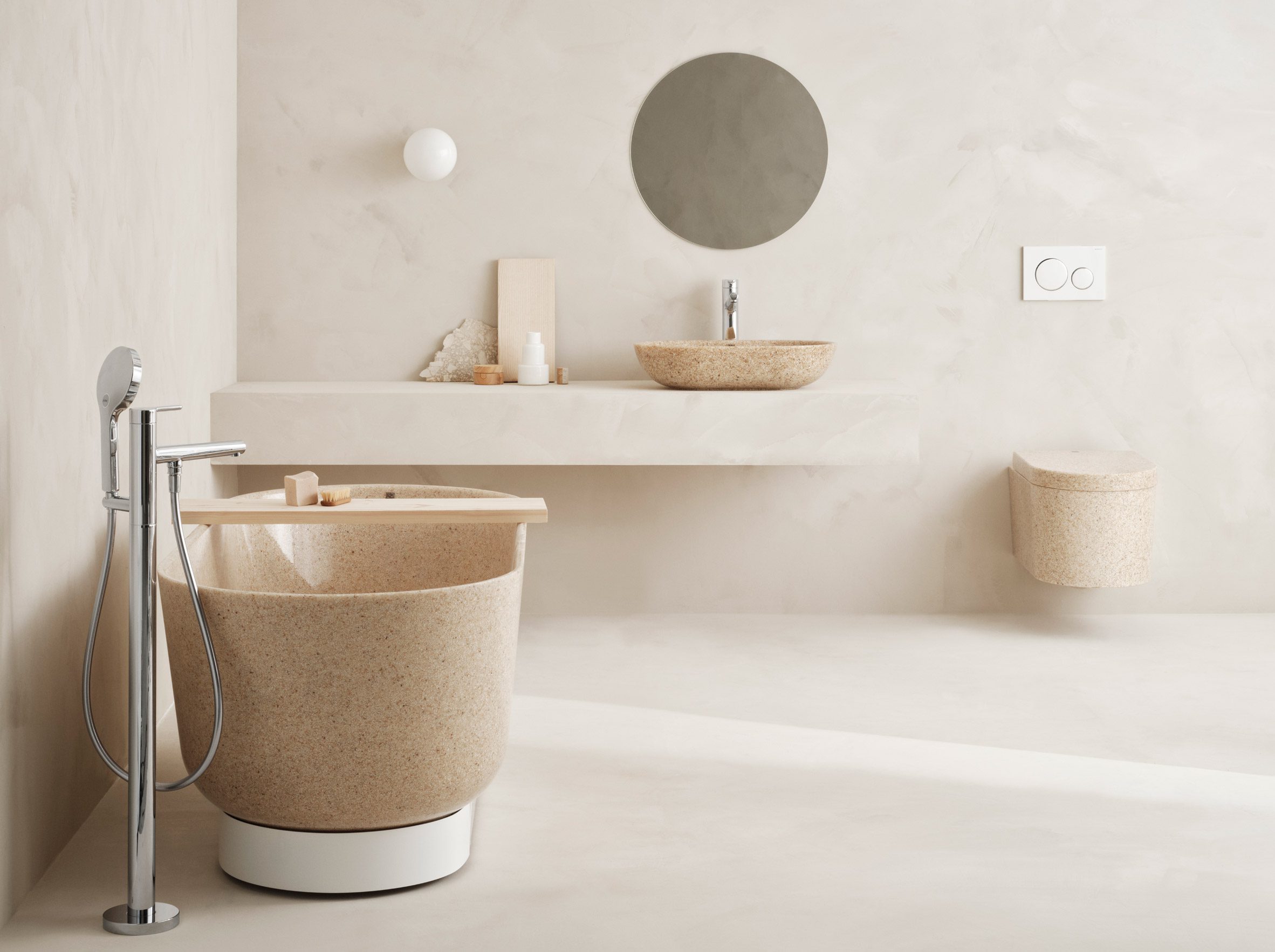 Block toilet and matching tub and wash basins by Woodio in a bathroom