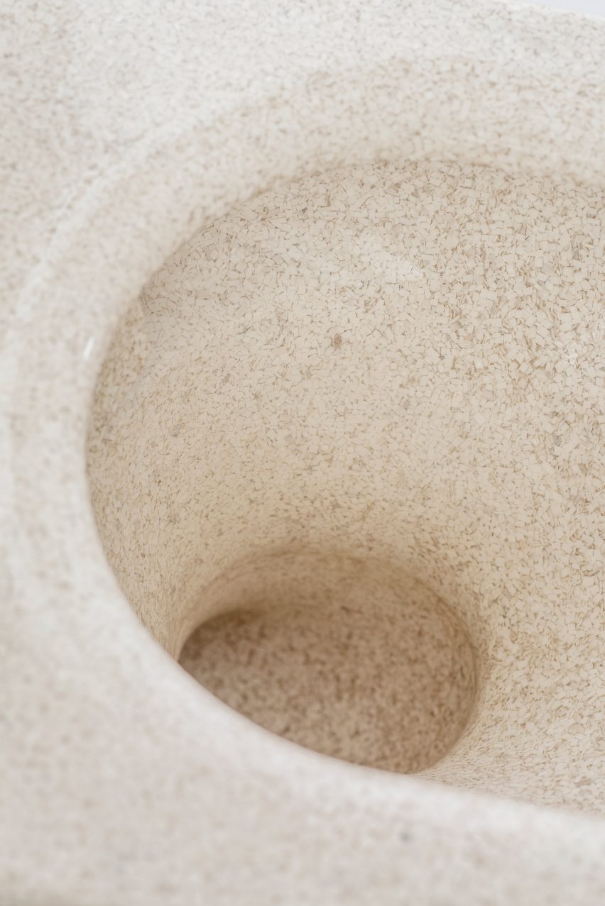 Close-up of the interior of a composite wood toilet bowl 