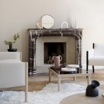 Photo of a fireplace with home accessories