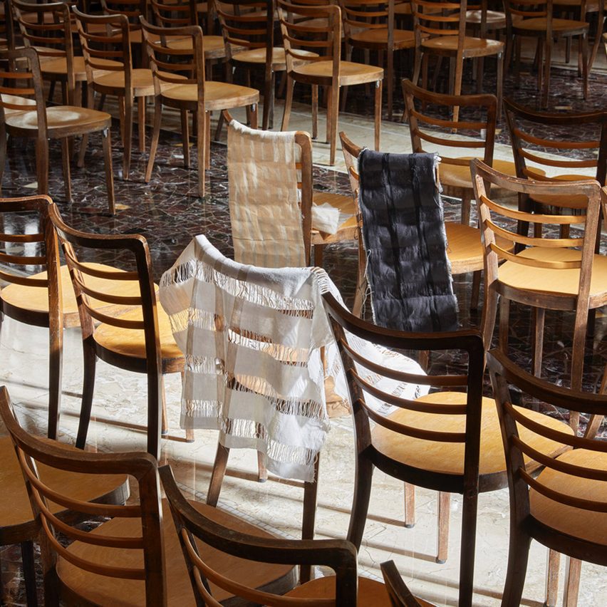 Photo of wooden chairs and fabric