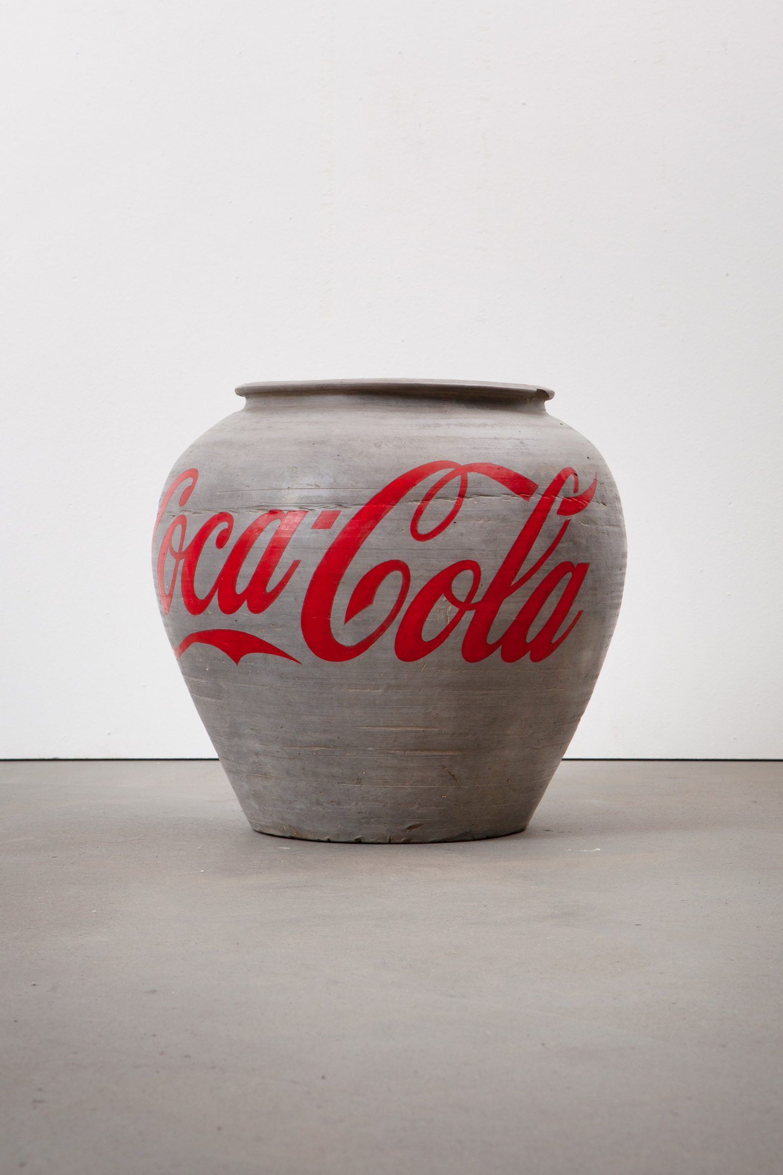 Urn painted with a Coca Cola logo by Ai Weiwei