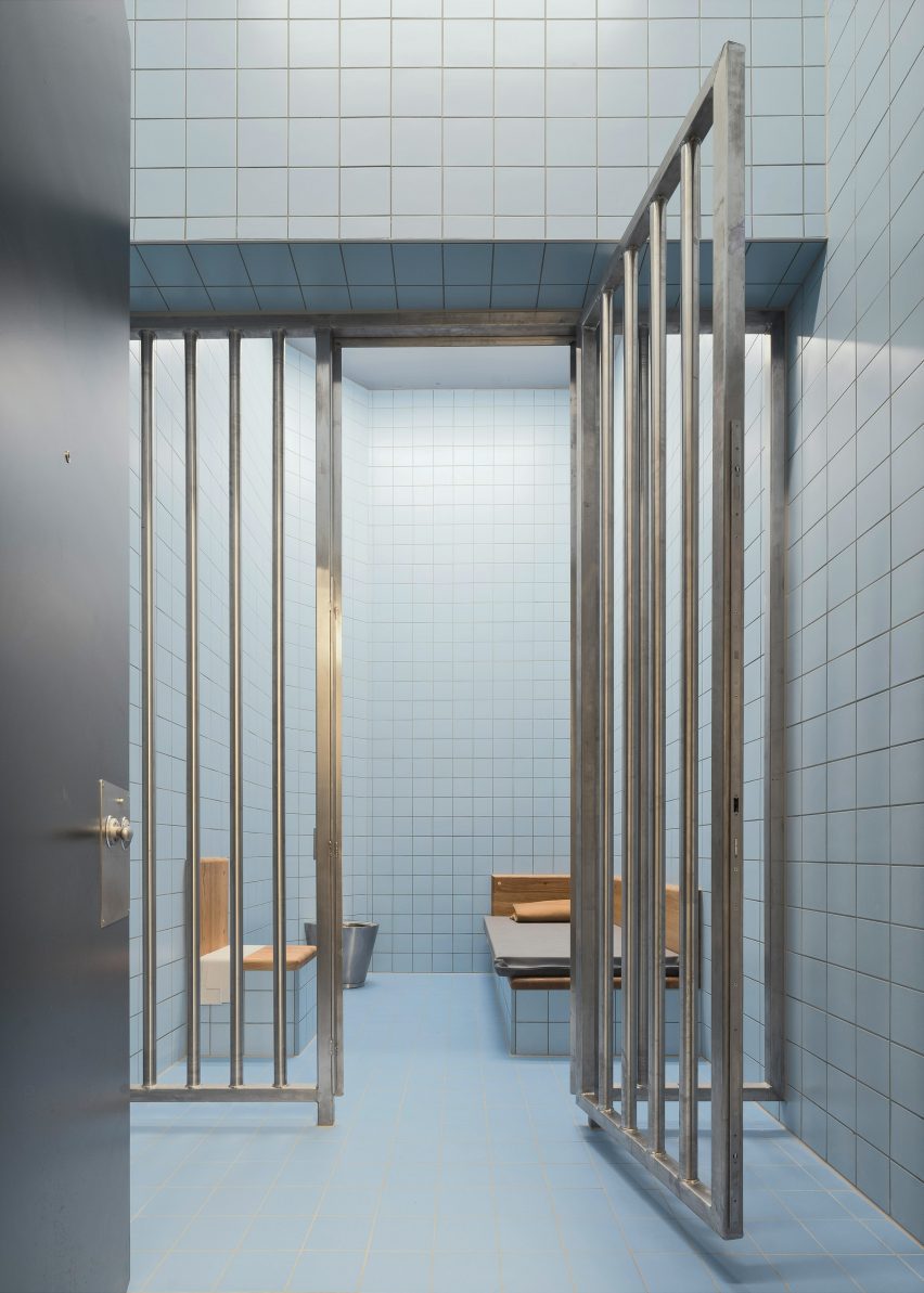 Pale blue tiles in police cell