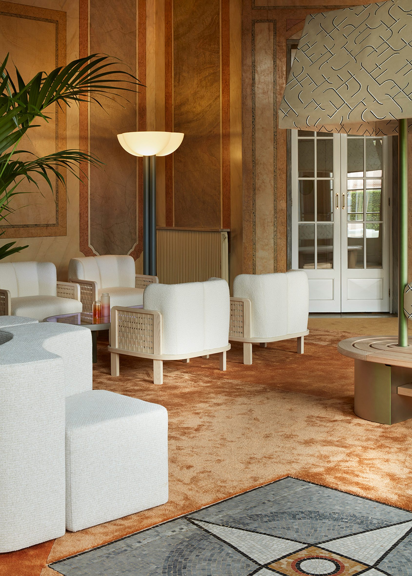 Chairs in Clay Court Club installation at Milan design week by Cristina Celestino