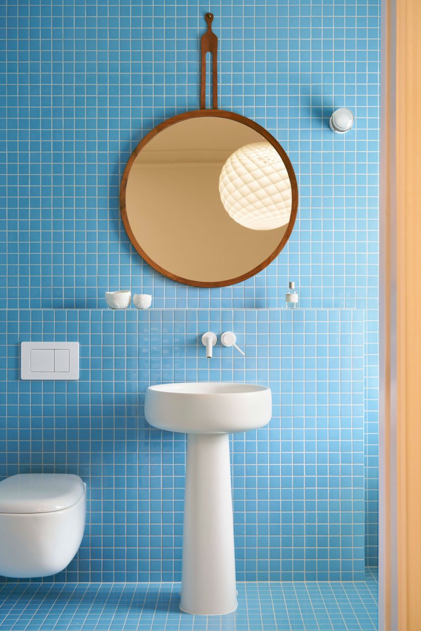 Blue-tiled bathroom of London home interior by Daytrip
