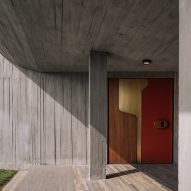 Covered walkway with board-formed concrete walls
