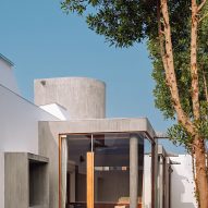 One-storey concrete home with floor-to-ceiling glazing