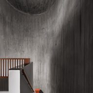 Top of a staircase with rounded concrete walls
