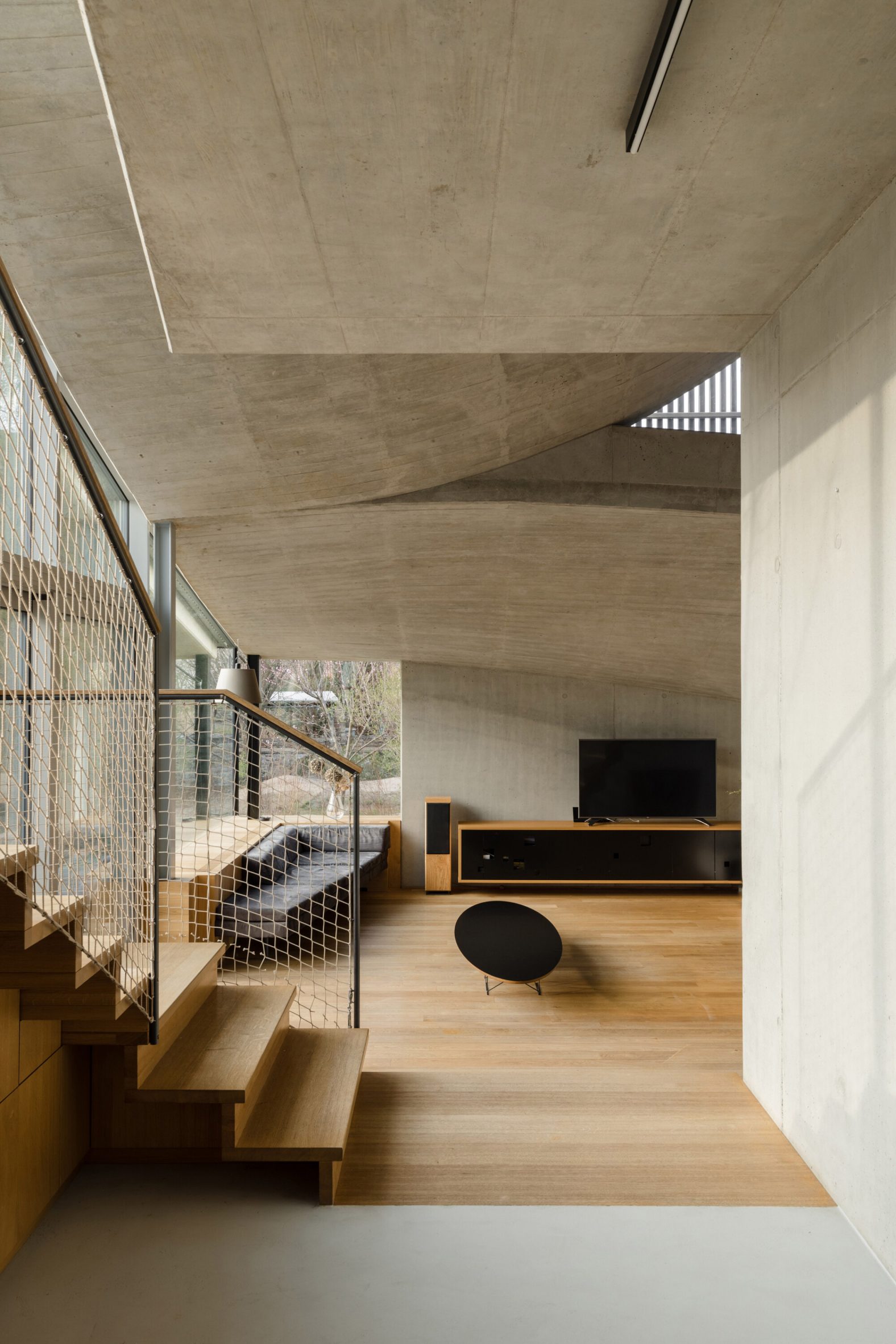 Concrete interior of Czech house by RO_AR
