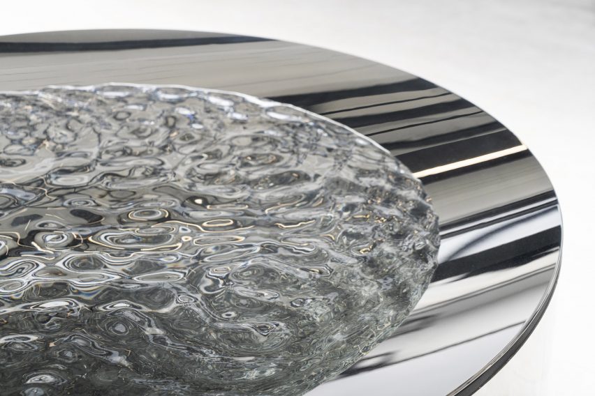 Ripping water in a stainless steel basin by Lachlan Turczan