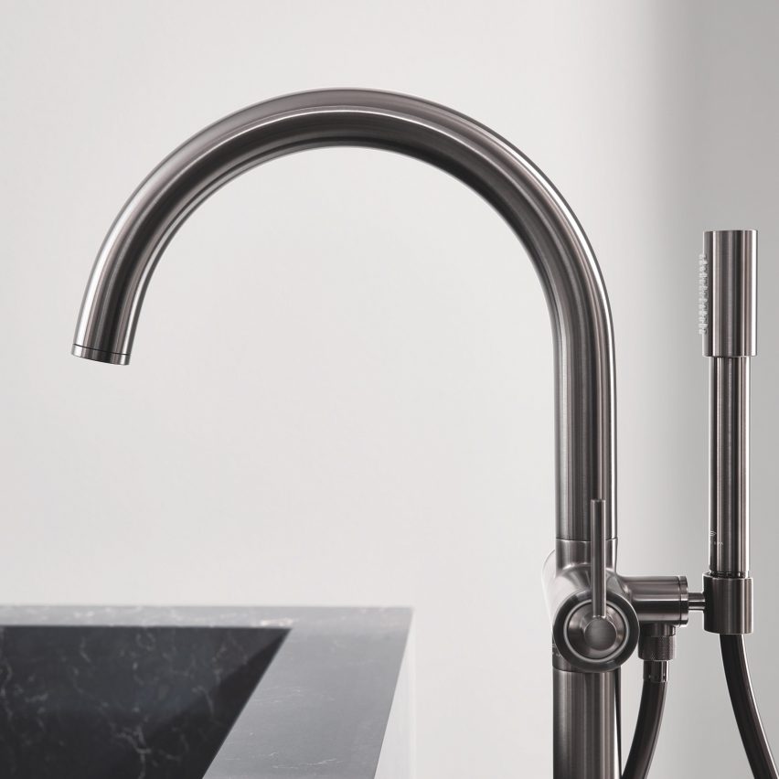 Curved tap with shower wand attachment