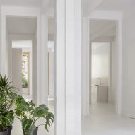 Interior with white walls, floors and square columns