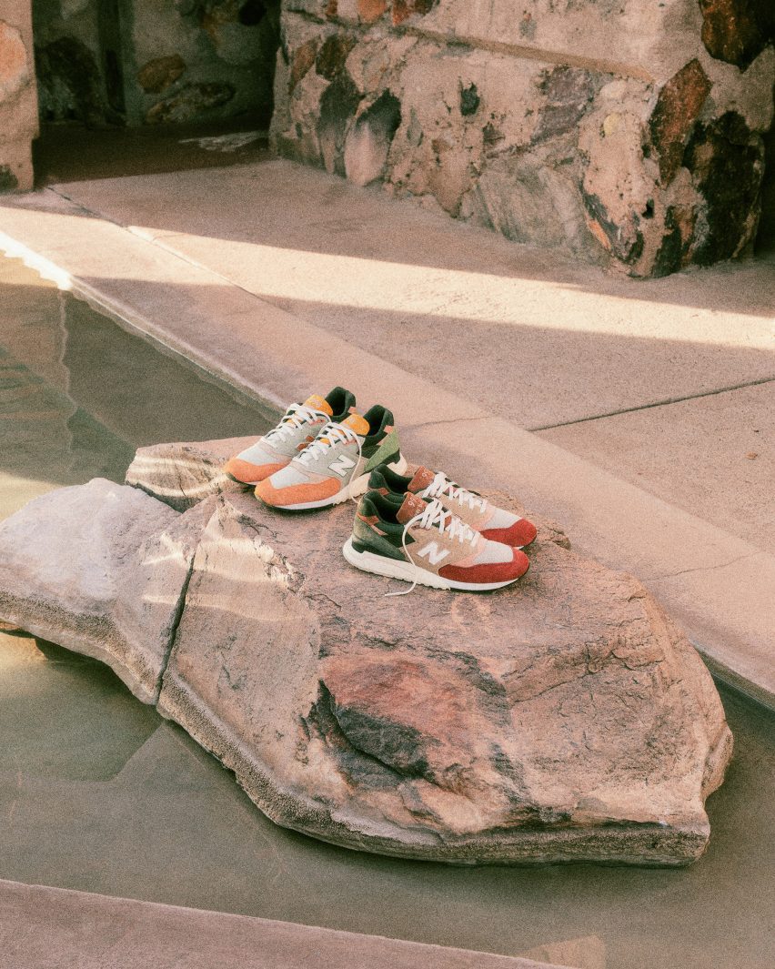 New Balance sneakers on a rock