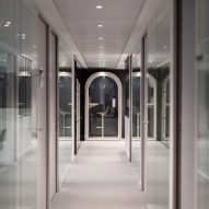 Acoustic office pod in workplace corridor